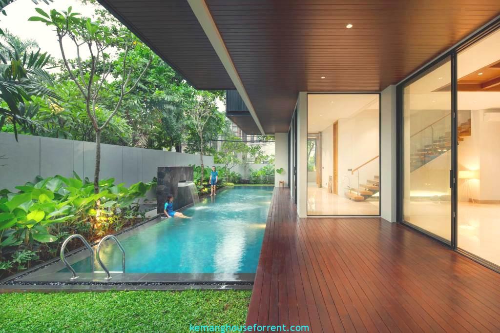 Gambar rumah modern minimalis di area Kemang dengan kolam renang kecil.