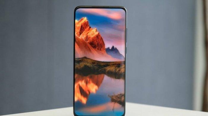 Layar penuh ponsel tanpa adanya notch atau punch-hole, menunjukkan kamera depan tersembunyi.