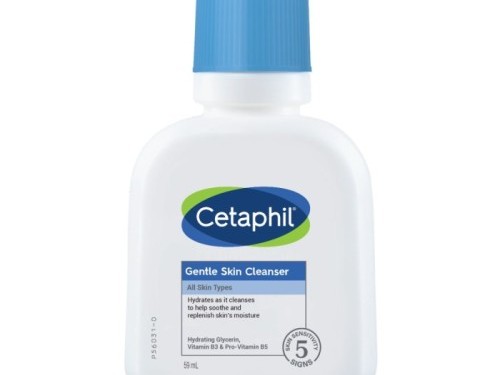Gambar botol Cetaphil Gentle Skin Cleanser dengan estetika minimalis dan bersih, menonjolkan sifat lembut dan melembapkannya, mungkin dengan grafik samar zona kulit yang seimbang, dengan latar belakan