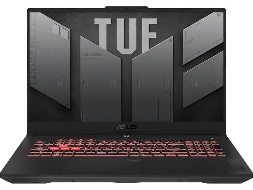 Gambar ASUS TUF Gaming F15/A15 di alas gaming, dengan pencahayaan RGB yang halus, di pengaturan gaming kasual, dengan latar belakang yang mengisyaratkan Cibubur Junction Jakarta Timur.