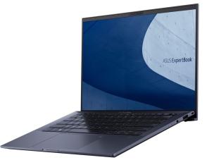 Gambar ASUS ExpertBook atau laptop ASUS yang tangguh serupa di lingkungan luar ruangan atau lokasi konstruksi, menonjolkan daya tahannya, dengan latar belakang Pacific Place Jakarta Selatan.