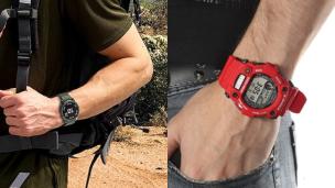 Jam tangan outdoor tangguh di pergelangan tangan, dengan latar belakang gunung atau hutan.