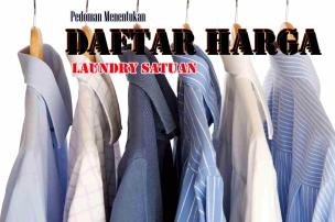 Jas dan gaun digantung rapi di hanger di tempat laundry satuan Prima Laundry.
